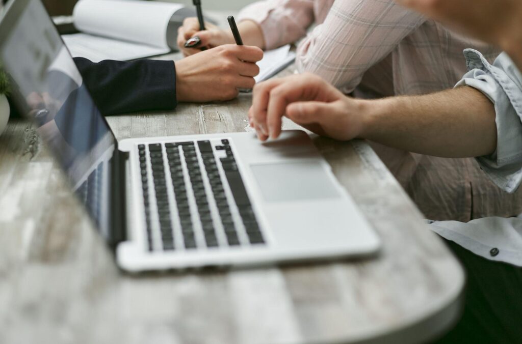 Blog 1 - In Content 1 Employee working on a laptop with a standard user account instead of administrator access